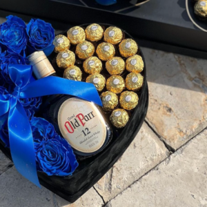 Caja de rosas y Old Parr